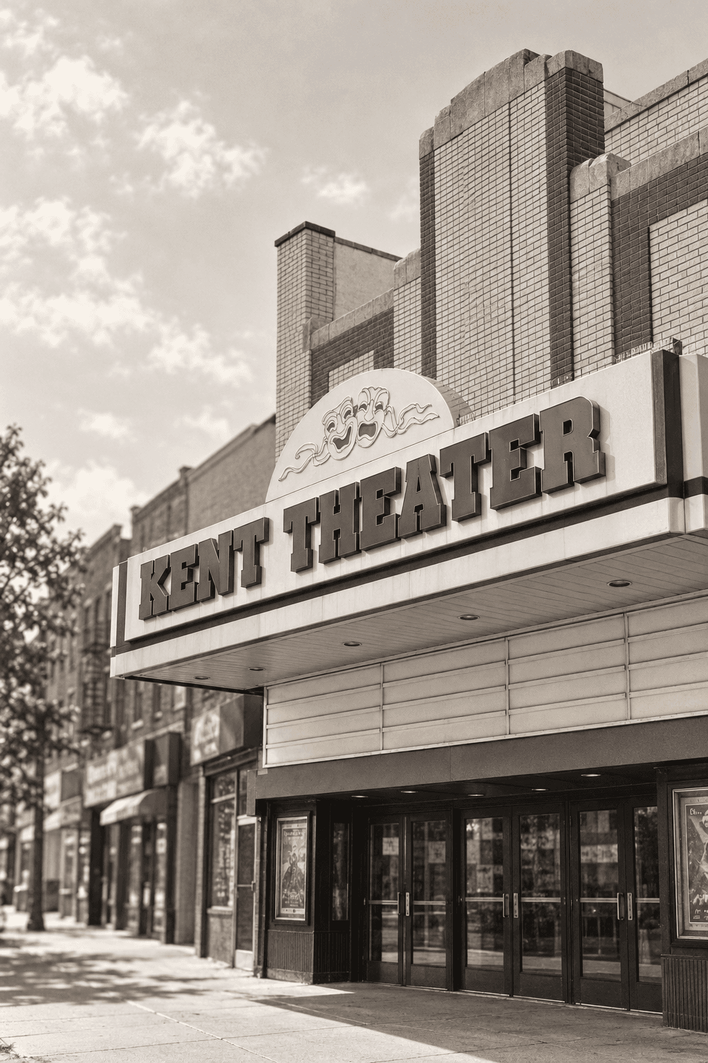 Photographic study of Kent Theater’s brick facade and horizontal marquee